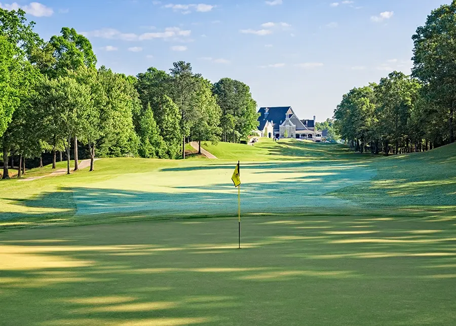 founders course flag clubhouse in background
